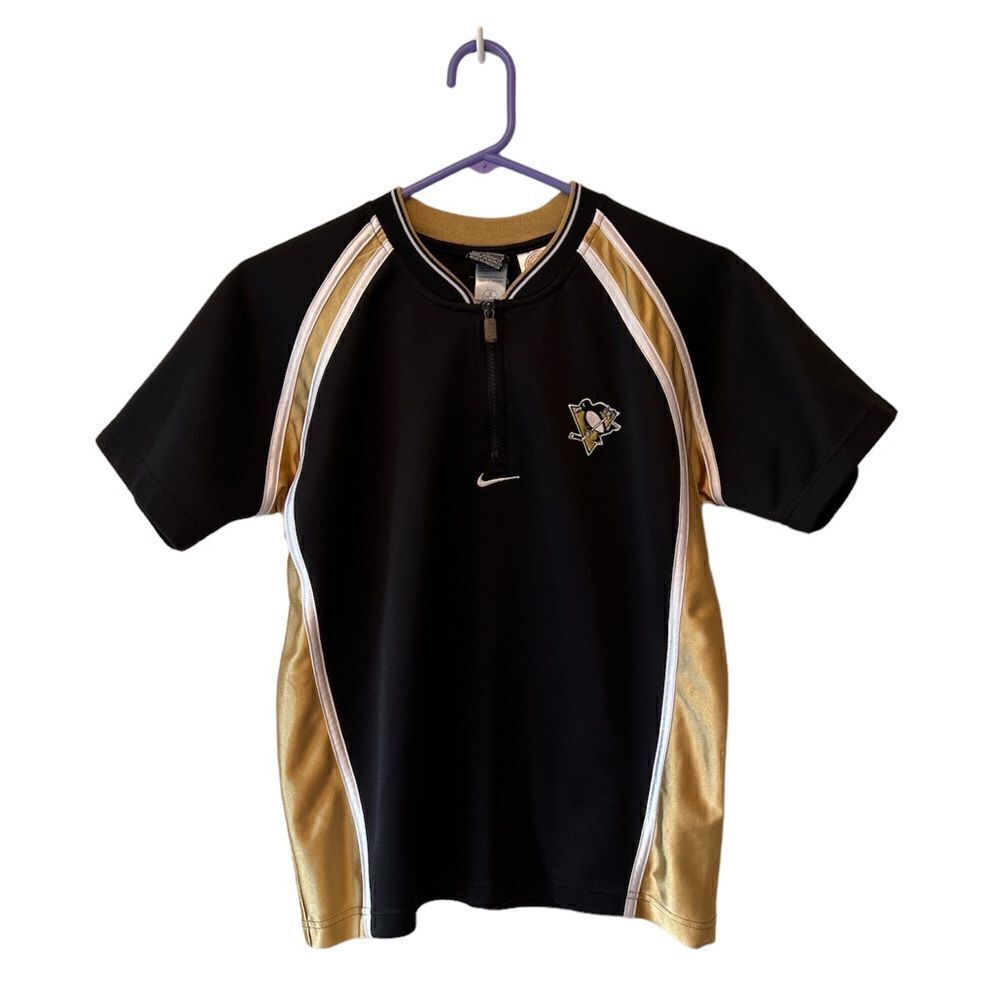 Nike Pittsburgh Penguins youth boys size medium (12-14) half zip jersey.